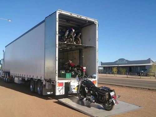 Delhi Transport Packers safely transporting motorcycles with protective packing and secure carriers in Delhi